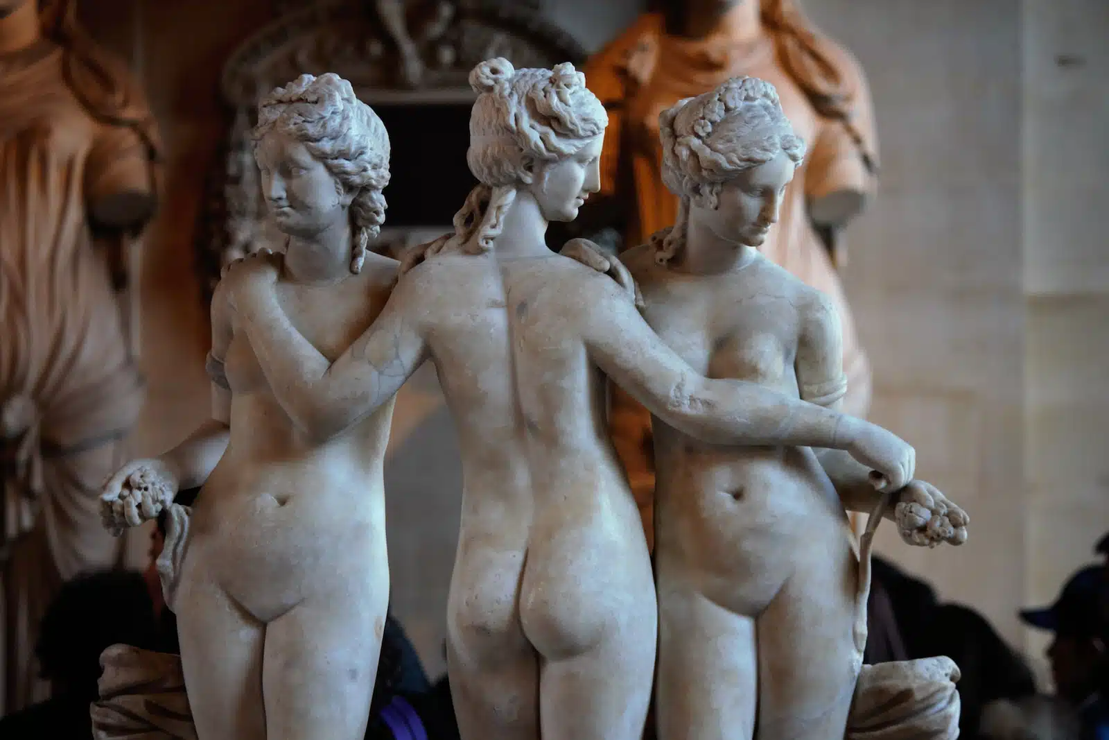2 topless women ceramic figurine